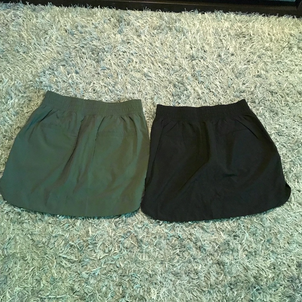 Two green and black Apana skirts-sold together